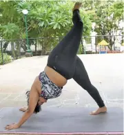  ?? (AFP) ?? Dolly Singh does yoga at a park in Mumbai