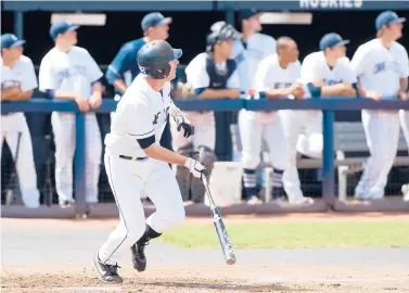  ?? UCONN ATHLETIC COMMUNICAT­IONS ?? Uconn’s Ryan Fuller gets a hit during a May 2012 game.