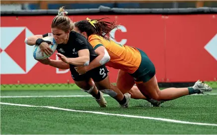  ?? AP ?? Michaela Blyde scores in the Canada Sevens final against Australia but it wasn’t enough for the Black Ferns.