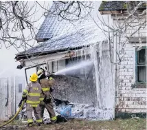  ?? JAMES VAUGHAN PHOTO ?? Firefighte­rs tackled a morning blaze at an abandoned property in Wellington, Yarmouth County on Monday morning.