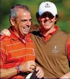  ??  ?? CLOSE: McGinley and McIlroy