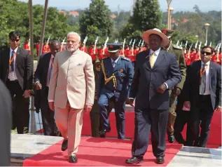  ?? Picture: AP Photo/Stephen Wandera ?? WARM WELCOME: Indian Prime Minister Narendra Modi is received by Ugandan President Yoweri Museveni after inspecting a parade at State House Entebbe about 42 kilometers Southeast of the capital Kampala.