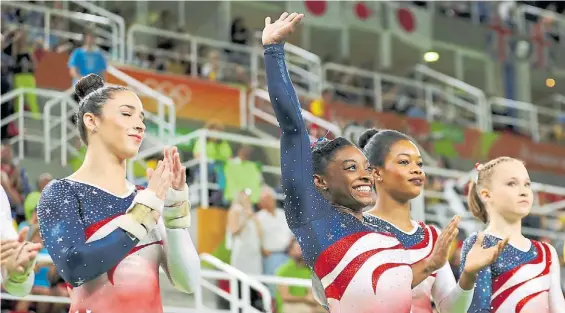  ?? REUTERS ?? Ellas. Simone Biles (centro), Aly Raisman y Gabrielle Douglas -a sus costados- son algunas de las gimnastas célebres que testimonia­ron.