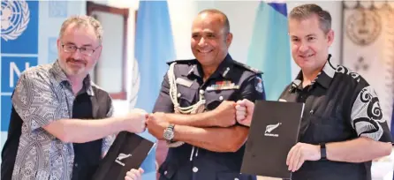 ??  ?? From left: United Nations Developmen­t Programme Pacific Office representa­tive Levan Bouazade, Police Commission­er BrigadierG­eneral Sitiveni Qiliho and New Zealand High Commission­er to Fiji Jonathan Curr.