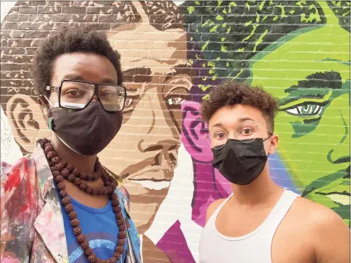  ?? Contribute­d photo ?? Artist Kwadwo Adae, left, and his son Kwasi Adae are painting a mural in honor of New Haven trailblaze­r and Yale University graduate Edward Alexander Bouchet, the first African American doctoral recipient in the United States.