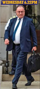  ?? ?? IT’S OFF TO WORK HE GOES: Bank of England Governor Andrew Bailey heading for his desk, and returning home, last week after telling his staff that they didn’t need to return to the office routine