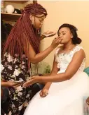  ??  ?? LAST MINUTE TOUCH-UP: Thekiso is a favourite with brides
