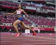  ?? PETR DAVID JOSEK - THE ASSOCIATED PRESS ?? Sydney McLaughlin, of the United States, wins the women’s 400-meter hurdles final at the 2020 Summer Olympics, Wednesday, Aug. 4, 2021, in Tokyo, Japan.
