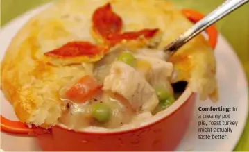  ??  ?? Comforting: In a creamy pot pie, roast turkey might actually taste better.