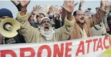  ?? S.S MIRZA/ AFP/GETTY IMAGES ?? Pakistani demonstrat­ors shout anti-U.S. slogans during a protest in Multan on Jan. 8 against drone attacks in Pakistan’s tribal areas.