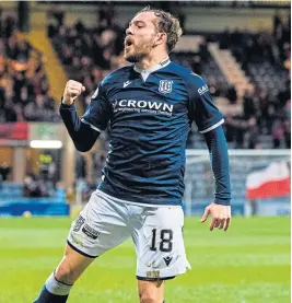  ?? ?? Dundee’s Paul Mcmullan punches the air after making it 1-1