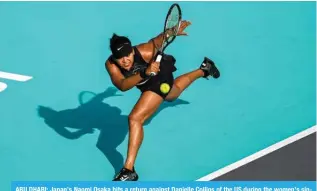  ?? ?? ABU DHABI: Japan’s Naomi Osaka hits a return against Danielle Collins of the US during the women’s singles match at the Mubadala Abu Dhabi Open tennis tournament in Abu Dhabi on February 6, 2024. — AFP