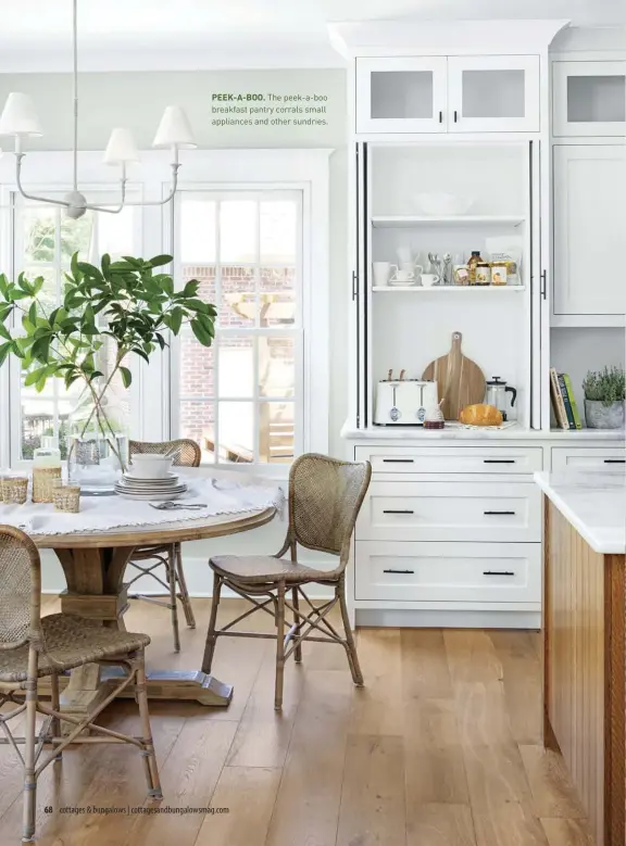  ??  ?? PEEK-A-BOO. The peek-a-boo breakfast pantry corrals small appliances and other sundries.