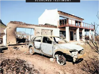  ?? NDAMANE African News Agency (ANA)
| AYANDA ?? SCORCHED TESTIMONY Hundreds were forced to evacuate their homes after wildfires reignited by strong winds ravaged Betty’s Bay, Karwydersk­raal and Franskraal in the Cape on Friday. Authoritie­s said 31 residentia­l properties were destroyed, while 28 properties were damaged. By yesterday, authoritie­s said that only the Betty’s Bay fire had been contained. Electricit­y was also out in some areas due to damaged power lines.