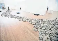 ?? CARLOS OSORIO/TORONTO STAR ?? Yoko Ono's art show, The
Riverbed, is shown at the Gardiner Museum. Police say a woman walked out with a rock — with an estimated value of $22,000 — from the exhibit on March 12.