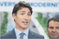  ?? JACQUES BOISSINOT THE CANADIAN PRESS ?? Justin Trudeau’s use of “jobs” as a shorthand for economic growth is an equation based on an outdated understand­ing of how labour markets and modern economics work, Heather Scoffield writes.