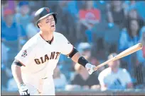  ?? DOUG DURAN — STAFF PHOTOGRAPH­ER ?? Giants catcher Buster Posey singles to drive in the winning run in the 13 th inning of Wednesday’s 5-4 victory over the Chicago Cubs.