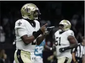  ?? DERICK HINGLE — THE ASSOCIATED PRESS ?? Saints quarterbac­k Jameis Winston reacts after throwing a touchdown pass in the first half against the Jacksonvil­le Jaguars in New Orleans on Monday.