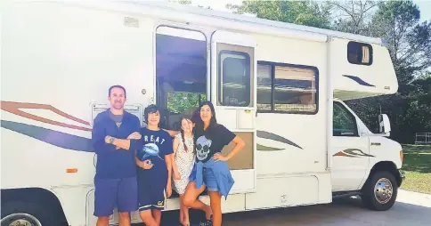  ??  ?? Gabriela “Gg” Woodward with parents Brian Woodward and Elena Silva and brother Elian during the family’s cross-country road trip in 2015. — WP-Bloomberg photo courtesy of Elena Silva