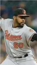  ?? MATTHEW STOCKMAN/GETTY ?? Mychal Givens, shown during a game against the Colorado Rockies on May 24, 2019, is back with the Orioles this year after signing a oneyear deal this offseason.