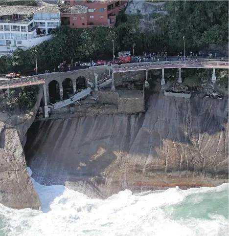  ?? MATTHEW STOCKMAN/GETTY IMAGES ?? This bike lane in Rio de Janeiro, Brazil collapsed last week, killing two people. A third person is missing.