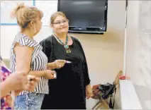  ?? Rachel Aston Las Vegas Review-journal @rookie__rae ?? Mayra Crum, right, speaks to Maria Valdespino at the city’s citizenshi­p class June 19 at the Stupak Community Center.