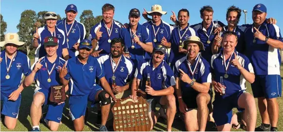  ?? Photo: Contribute­d ?? SHIELD WINNERS: Darling Downs South West Queensland celebrate their Schaeffer Shield victory on the Sunshine Coast.