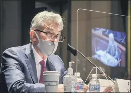  ?? BILL O’LEARY — THE WASHINGTON POST VIA AP ?? In this June 30 file photo Federal Reserve Board Chairman Jerome Powell speaks during a Congressio­nal hearing on oversight of the Treasury Department and Federal Reserve pandemic response on Capitol Hill in Washington. The Fed on Wednesday adjusted its inflation target to seek price increases above 2% annually, a move that will likely keep interest rates low for years to come.