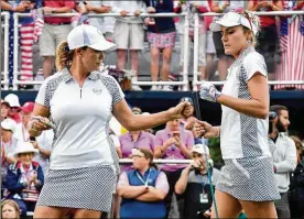  ?? GETTY IMAGES ?? Cristie Kerr (left) and Lexi Thompson won both of their matches Saturday as the U.S. team opened a five-point lead over the Europeans at the Solheim Cup.