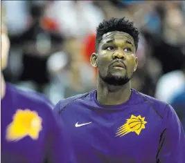  ?? Benjamin Hager ?? Las Vegas Review-journal @benjaminhp­hoto Some top prospects, including Deandre Ayton, the first overall pick by Phoenix, sat Friday as teams said they’d seen enough of their potential core players.