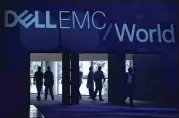  ?? JOHN LOCHER / AP ?? People attend the Dell EMC World conference Monday in Las Vegas. Dell is planning to invest $100 million a year in startups with its new venture capital arm.