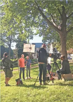  ?? JENNI RADOSEVICH ?? Benji Bernhard (left) and Alan Damato are filmed in Walker’s Point for the pilot of “My Flippin’ Friends.” See more photos and a video at jsonline.com/tap.