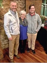  ?? / Amy Jackson ?? Martha Eaker, pictured with her son Travis (left) and her grandson Jake (right), recently retired as president and CEO of the Catoosa County Chamber of Commerce.