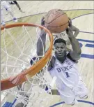  ?? Chuck Burton / Associated Press ?? Duke’s Zion Williamson had 21 points to help lead the Blue Devils past Florida State on Saturday.