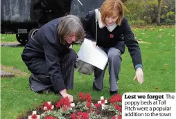  ??  ?? Lest we forget The poppy beds at Toll Pitch were a popular addition to the town