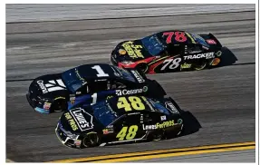  ?? JARED C. TILTON / GETTY IMAGES ?? Jimmie Johnson’s (48) struggles last year did nothing to deter the Hendrick lifer from signing a three-year contract extension with the team.