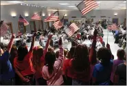  ?? BILL UHRICH - MEDIANEWS GROUP ?? Lorane Elementary School third- and fourth-graders perform “Because of You” during a Veterans Day celebratio­n at the school in Exeter Township.