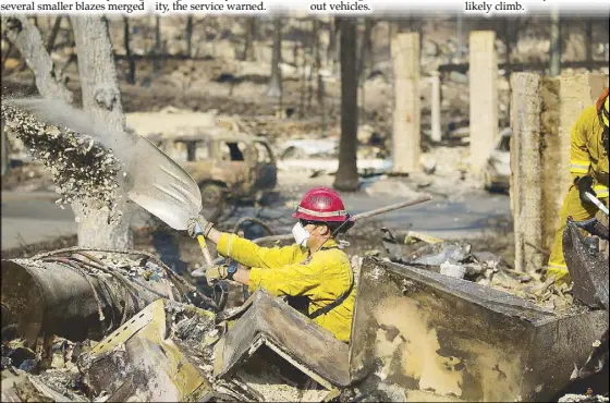  ?? AFP ?? Firefighte­rs search through the rubble of a home in the Fountaingr­ove neighborho­od for a strongbox and a wedding ring on Friday in Santa Rosa, California.