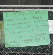  ?? Teresa.canino@gfrmedia.com ?? ESPERAN MÁS. Numerosos negocios se han visto obligados a cerrar, lo que suma más personas des empleadas.