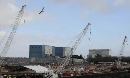  ?? Toby Melville/Reuters ?? Nuclear reactors A and B at Hinkley Point in south-west England; the latter is currently due to go out of service this summer. Photograph: