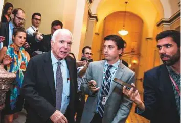  ?? AFP ?? Senator John McCain leaves the Senate Chamber after the vote on a stripped-down version of Obamacare yesterday. He was one of three Republican Senators to vote against the measure.