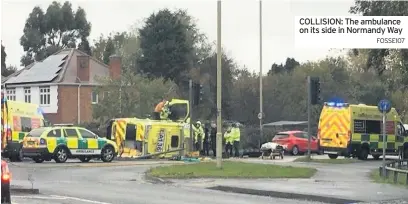  ?? FOSSE107 ?? COLLISION: The ambulance on its side in Normandy Way