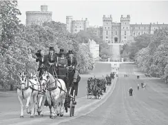  ??  ?? After the ceremony, they’ll take a carriage ride that includes the Long Walk. AP