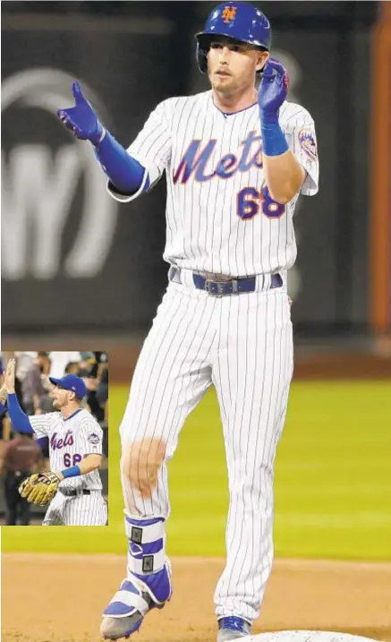  ?? AP ?? Jeff McNeil celebrates after hitting RBI double in 8th inning, then again with Wilmer Flores after Mets’ victory over Giants.