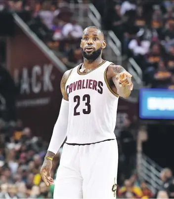  ?? JASON MILLER/GETTY IMAGES ?? LeBron James will face the biggest challenge of his career when the inevitable showdown between his Cavaliers and Golden State takes place for a third time.