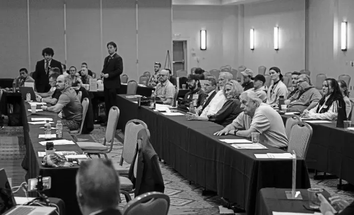  ?? Rachel Woolf, Special to The Denver Post ?? Attendees listen to a discussion during the annual Libertaria­n Party of Colorado State Convention at the Denver Marriott West hotel on May 22 in Golden.