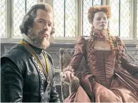  ?? LIAM DANIEL THE ASSOCIATED PRESS ?? Guy Pearce, left, and Margot Robbie star as William Cecil and Queen Elizabeth I in the new film Mary Queen of Scots.