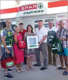  ??  ?? Yohan Hunt of Tralee Community Responders, Audrey Moran, Danny Casey from Spar, Eileen Whelan from Paco, Norman Foley and Kieran Ahern of Spar, and Cllr Sam Locke, as they received two new defibrilla­tors for Kerry last week.
