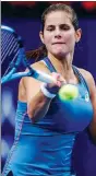  ?? PROVIDED TO CHINA DAILY ?? Defending champion Julia Goerges hits a return during her opening group loss to Anett Kontaveit at the WTA Elite Trophy Zhuhai on Wednesday.