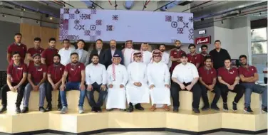  ??  ?? ↑ Top officials with employees pose for a group photo at the opening of the new facility.